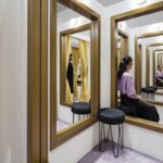 Leandro Erlich, Changing rooms (2008). Paneling, stools, golden frames, mirrors, curtains, carpet and lights. Dimensions variable. ©Kioku Keizo, Morti Art Museum. Courtesy Galleria Continua