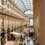 people inside galleria vittorio emanuele ii shopping mall in italy