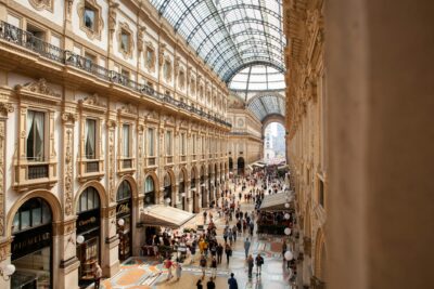 people inside galleria vittorio emanuele ii shopping mall in italy